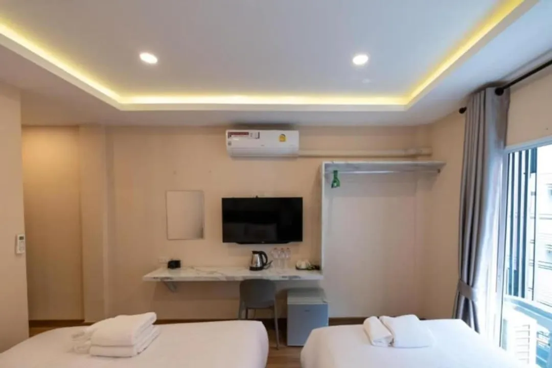 Amber Inn-Triple Room with Balcony-3