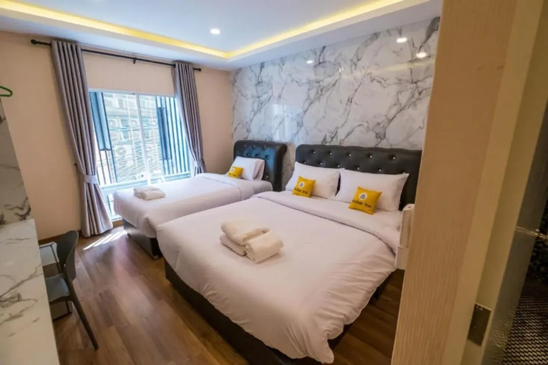 Amber Inn-Triple Room with Balcony-1