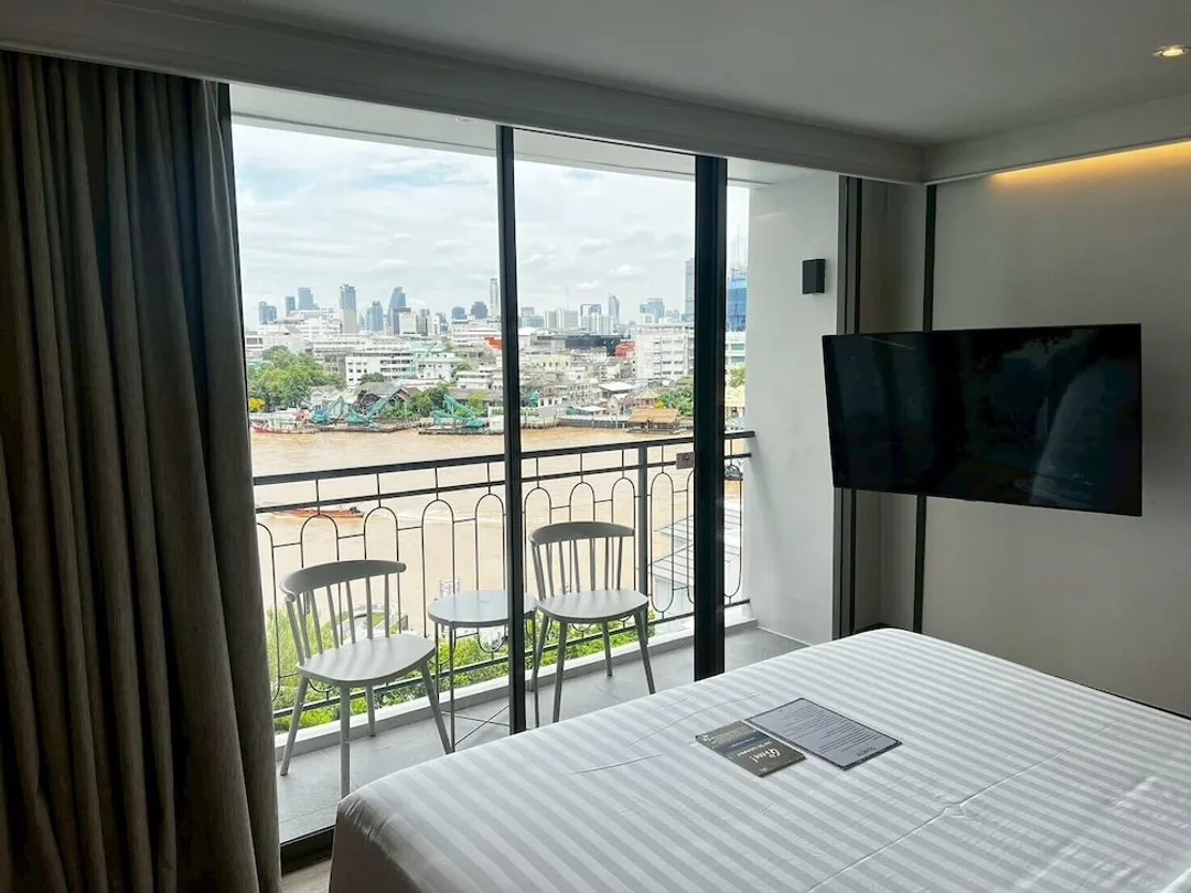 UHG의 쿼터 차오프라야-Family Room River View King Bed-1